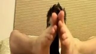 Stud Rubs His Feet While Using His Fleshlight On Himself