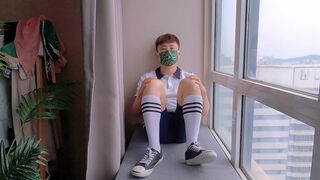 Boy in school uniform masturbates and cums by the window