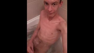 Very skinny teen shows himself putting his head underwater