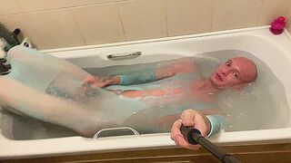 Fully Shaved Skinny bald femboy takes bath in feminine clothing