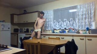 VERY SKINNY TEEN WEARS HIS STEPMOMS PANTIES AND MASTURBATES IN THE KITCHEN!