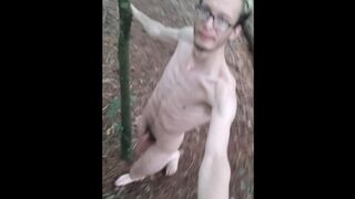 Very skinny british femboy running naked purely naked inside a Forest with a selfie stick