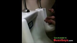 Two Slim Dicks Getting Wanked At The Urinals