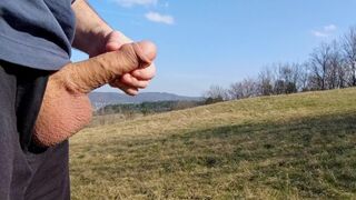 Big dick cum twice in the middle of huge meadow, anybody could watch me
