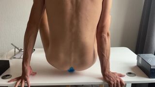 Home office perk: anal play on the desk. Put that dildo in the ass.