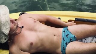 Outdoor Kayak Jerk — Canadian Guy Strips, Strokes, and Floats Away