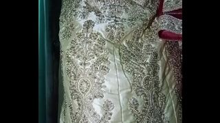 Indian gay Crossdresser Gaurisissy xxx sex in Golden Saree pressing his boobs and fingering his ass