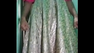 Indian Gay Crossdresser Gaurisissy in Pink lehanga pressing his Boobs and fingering in his ass