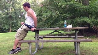 Masturbating in the public park next to the busy road.