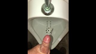 Risky public washroom urinal masturbation and cumshot