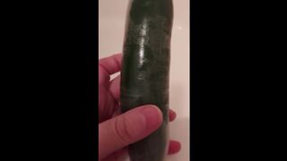 Fucked with a condom covered cucumber (repost)