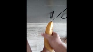 Guy solo fucks banana and cums on the floor
