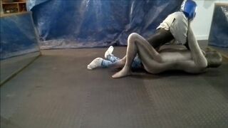 crocodile zentai struggles against masked dummy wrestler