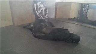 skeleton wearing a wetsuit