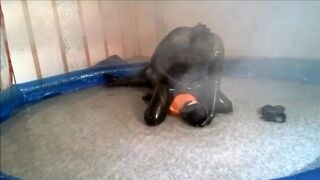 Frogman humps and shoots over surfer in shallow pool water