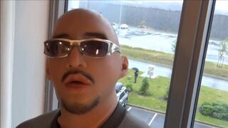 silicone masked wetsuited guy gets horny at hotel window and humps his pillows