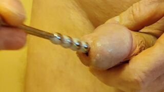 Insertion of my new extra long urethral plug.