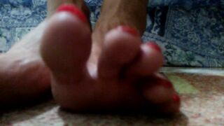 Red long toenails teasing