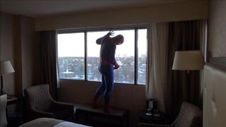 spider shoots onto hotel window