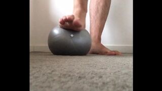 Super squishy gym ball under my big male feet tiny ball makes my feet feel enormous - MANLYFOOT