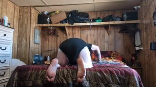 pup plays with whip and toy