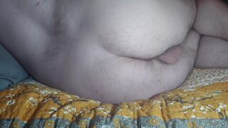 Lay in on my side and slapping my butt