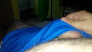 Masturbating in  bed.