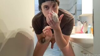 filming naked while peeing on one's dirty clothes and squeezing them into his hand