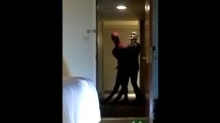 skeleton faced frogman in hotel