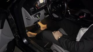 Young Buisnessman cranking his Mercedes