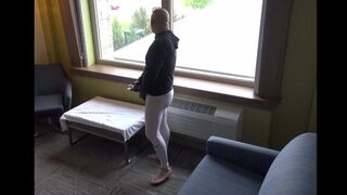 barefoot in leggings jerking off in cock sleeve at hotel window