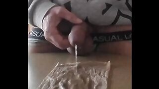 I piss and jerk off with my piss, my balls tied with a string,