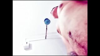 Testing a dildo in the bathtub