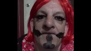 bisexual crossdressing gay mark wright has painted cocks on his face while he licks his cum clean of his hand and shows you it in his mouth afterwards