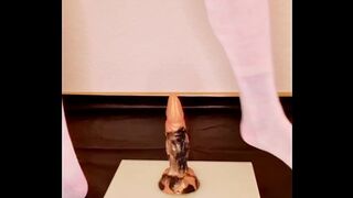 sissy lifts her ass with vibrator using chastity belt