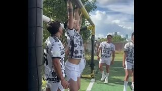 A soccer team, with the help of the sun, and sweat, ends up nailing each other.