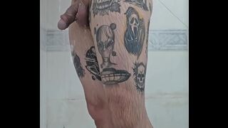 Chubby guy got caught on camera masturbating in the shower.