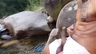Curious taking rolls in the waterfall