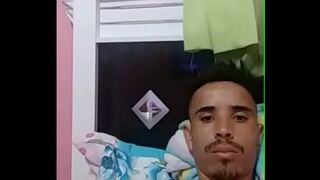 Favelado showing the young man his 23cm