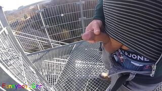I'm edit on my foreskin cock outside on a very public observation tower by a river.