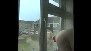 dildo gets fucked stuck on the window from two different angles as people walk by in one video with the one vote wanker