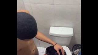 Sucking a 's big dick hidden in the club's bathroom!