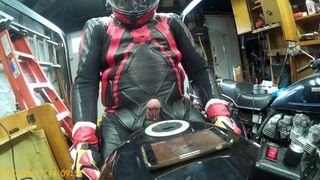 Leather biker milked on his motorcycle