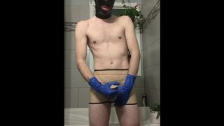 Rubber Boy Jerking Off in Sheath Shorts