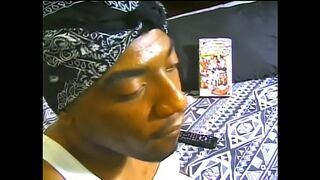 Ebony gangster Brown Eyes amuses himself watching gay porn and bringing himself off by hand