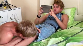 Part 1: Guy sucks his stepbrother's big dick while he plays on his phone
