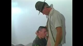 Sergeant getting his cock sucked by soldier in uniform in the office