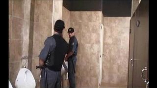 Teen and Security Guards in Shopping Toilettes