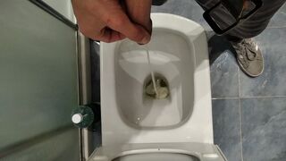 Big Cock Pisses in the Bathroom and then Jerks Off with Massage Body Oil