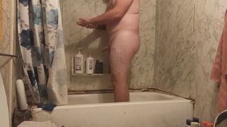 Fat guy jerks dick in shower and swallows own cum